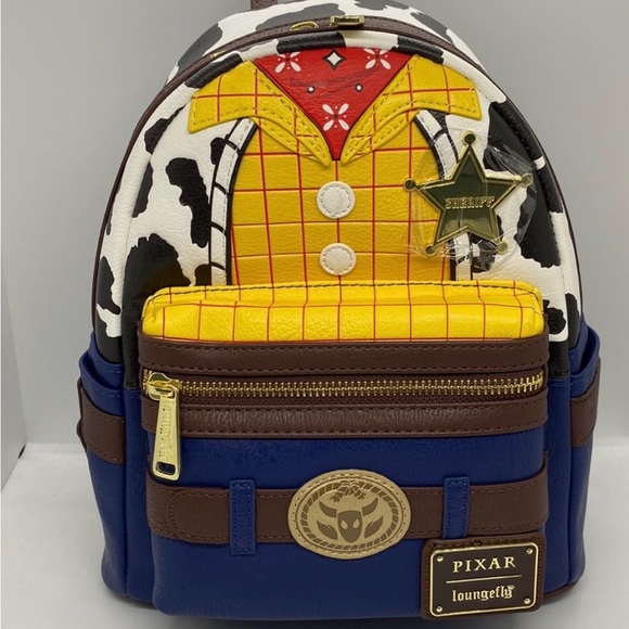 Loungefly Handbags - NWT Loungefly Disney Pixar Toy Story Woody Sheriff Cosplay Mini Backpack